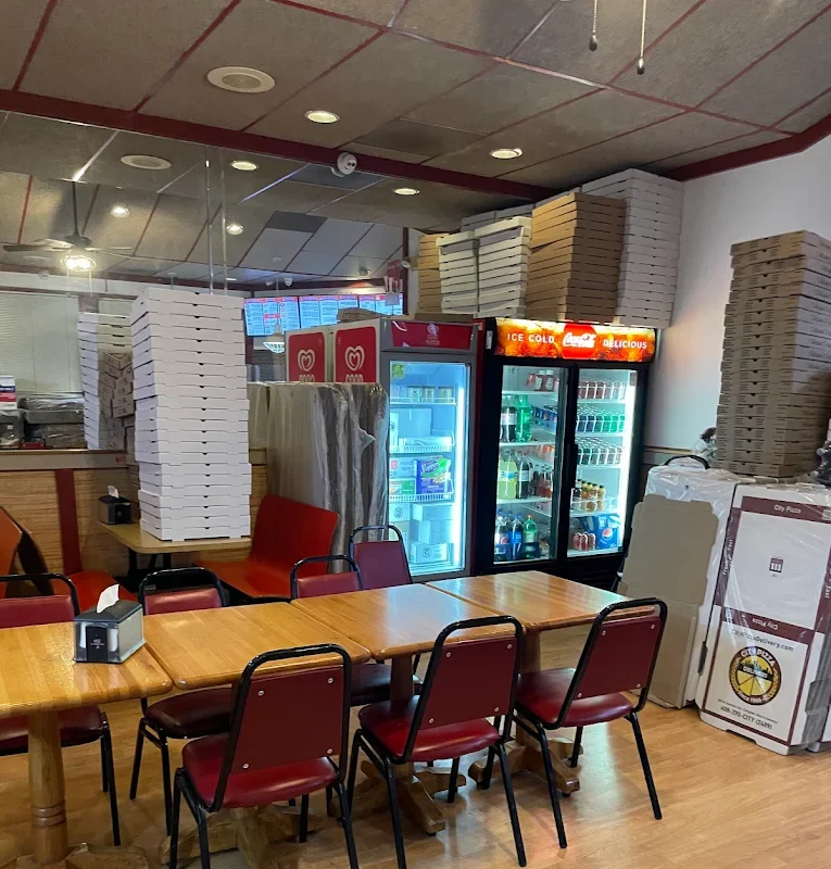 City Pizza catering boxes stacked and ready for corporate event delivery