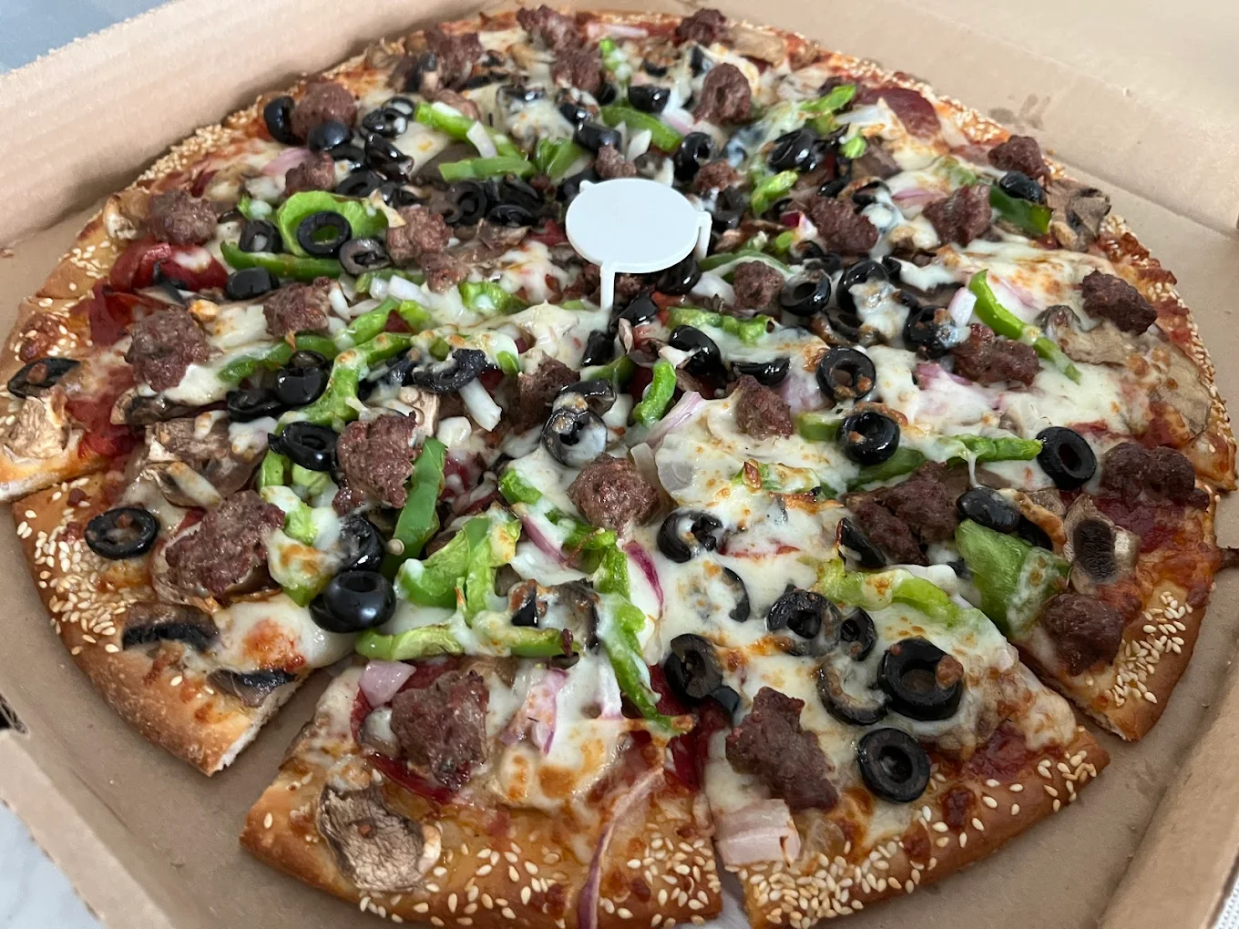 Large City Pizza meat lovers catering pizza in a delivery box